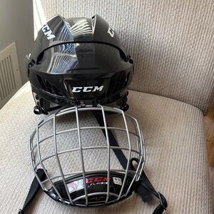 CCM Black Hockey Helmet with Silver Cage Face Mask